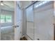 Bathroom view showcasing the step-in shower and access to the primary bedroom, providing convenience and style at 617 Chiswick Dr., Conway, SC 29526
