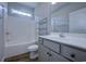 Well-lit bathroom featuring a shower-tub combo, modern vanity, and stylish fixtures at 617 Chiswick Dr., Conway, SC 29526