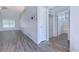 The entry has hardwood floors with open view to a bathroom and living room at 617 Chiswick Dr., Conway, SC 29526