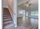 Open living area with view to the kitchen and staircase at 617 Chiswick Dr., Conway, SC 29526