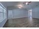 The living room has hardwood floors and an open view into another room at 617 Chiswick Dr., Conway, SC 29526
