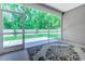 Screened porch with views of the private back yard at 617 Chiswick Dr., Conway, SC 29526