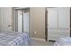Bedroom with twin beds, wardrobe, closet and access to additional rooms at 6253 Catalina Dr. # 534, North Myrtle Beach, SC 29582