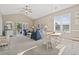 Comfortable living room open to the dining area, with plenty of natural light and a balcony at 6253 Catalina Dr. # 534, North Myrtle Beach, SC 29582