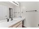 Bright bathroom featuring a sink, large mirror, and modern fixtures at 639 Waterway Village Blvd # 14-I, Myrtle Beach, SC 29579