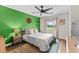 Cozy bedroom with a large window, soft carpet, and modern decor at 639 Waterway Village Blvd # 14-I, Myrtle Beach, SC 29579