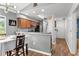 Charming kitchen with wood cabinets, granite countertops, and stainless steel appliances at 639 Waterway Village Blvd # 14-I, Myrtle Beach, SC 29579
