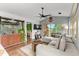 Bright living room with vaulted ceilings, hardwood floors, and comfortable seating at 639 Waterway Village Blvd # 14-I, Myrtle Beach, SC 29579