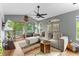 Bright living room with vaulted ceilings, hardwood floors, and comfortable seating at 639 Waterway Village Blvd # 14-I, Myrtle Beach, SC 29579