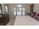 Bedroom features a large window, a dresser, and neutral decor at 690 Riverwalk Dr. # 201, Myrtle Beach, SC 29579