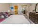 Bedroom featuring an ensuite bathroom and an expansive closet at 690 Riverwalk Dr. # 201, Myrtle Beach, SC 29579