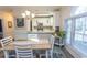 Open dining room featuring hardwood floors and views of the kitchen at 690 Riverwalk Dr. # 201, Myrtle Beach, SC 29579