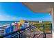 Picturesque balcony view of the ocean, beach and local buildings with inviting patio furniture at 7100 N Ocean Blvd. # 1421, Myrtle Beach, SC 29572