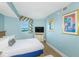 Cozy bedroom with one bed, window with colorful valance and modern furnishings at 7100 N Ocean Blvd. # 1421, Myrtle Beach, SC 29572