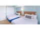 Bright bedroom featuring two beds, closet and modern furnishings at 7100 N Ocean Blvd. # 1421, Myrtle Beach, SC 29572