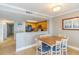 Dining area next to kitchen with wooden cabinets and granite countertops at 7100 N Ocean Blvd. # 1421, Myrtle Beach, SC 29572