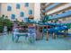 On-site waterpark featuring a water slide, tiki themed accents, and fountains at 7100 N Ocean Blvd. # 1421, Myrtle Beach, SC 29572
