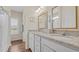 Bathroom featuring a double vanity with granite counters and wood floors at 716 Weston Dr., Conway, SC 29526