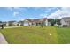 Attractive single-story home with a lush lawn, beautiful landscaping, and a cozy front porch at 716 Weston Dr., Conway, SC 29526
