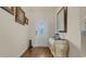 Elegant foyer with hardwood floors, decorative mirror, and stylish furniture at 716 Weston Dr., Conway, SC 29526