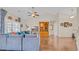 Bright living room with hardwood floors, high ceilings, and a beautiful built-in bookcase at 716 Weston Dr., Conway, SC 29526
