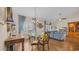 Open-concept living and dining area with lots of natural light and wood flooring at 716 Weston Dr., Conway, SC 29526
