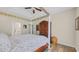 Bedroom with a four-poster bed, a ceiling fan, and wood floors at 716 Weston Dr., Conway, SC 29526
