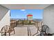 Relax on this balcony overlooking the putt-putt course with the ocean view beyond at 7200 N Ocean Blvd. # 553, Myrtle Beach, SC 29572