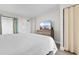Relaxing bedroom with a TV and a closet at 7200 N Ocean Blvd. # 553, Myrtle Beach, SC 29572