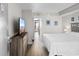 Comfortable bedroom with queen bed, balcony access, and a television for relaxing evenings at 7200 N Ocean Blvd. # 553, Myrtle Beach, SC 29572