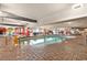 Indoor pool area with tables and chairs at 7200 N Ocean Blvd. # 553, Myrtle Beach, SC 29572