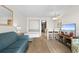 Combined living space with sofa and murphy bed with kitchen view at 7200 N Ocean Blvd. # 553, Myrtle Beach, SC 29572