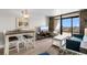 Open living area, dining area and access to balcony at 7200 N Ocean Blvd. # 553, Myrtle Beach, SC 29572
