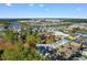 Aerial view of a community with colorful townhomes and mature trees on a sunny day in South Carolina at 788 Gabreski Ln. # B4, Myrtle Beach, SC 29577