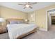 Bright bedroom with a wooden bed frame, natural light and soft carpet at 788 Gabreski Ln. # B4, Myrtle Beach, SC 29577