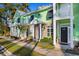 A colorful townhome with a cozy balcony, brick details, and manicured landscaping on a sunny day at 788 Gabreski Ln. # B4, Myrtle Beach, SC 29577