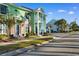 Charming townhouse with a quaint balcony, brick accents, and lush landscaping in a vibrant community at 788 Gabreski Ln. # B4, Myrtle Beach, SC 29577