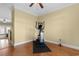 Additional flex space for gym equipment, showcasing hardwood floors, a ceiling fan, and easy access at 788 Gabreski Ln. # B4, Myrtle Beach, SC 29577