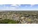 Aerial view pinpointing home's location within a community near a lake, pool, and lush greenery at 837 Sand Binder Dr., Myrtle Beach, SC 29579