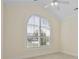 Bright bedroom features a window with shutters and neutral walls and ceiling at 837 Sand Binder Dr., Myrtle Beach, SC 29579