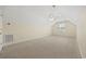 Spacious bonus room with neutral carpet, paint, a dormer window, and ceiling fan at 837 Sand Binder Dr., Myrtle Beach, SC 29579