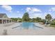 Community pool with ample seating, surrounded by lush landscaping and neighborhood homes at 837 Sand Binder Dr., Myrtle Beach, SC 29579
