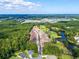 Aerial view of new development, golf course and mature trees at 9724 Indigo Creek Blvd., Murrells Inlet, SC 29576