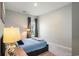 Cozy bedroom featuring a comfortable bed, carpet floors, and a window with natural light at 981 Mourning Dove Dr., Myrtle Beach, SC 29577