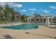 Resort-style pool and cabana, featuring lounge chairs, a large pool, and mature landscaping for relaxing outdoor living at 981 Mourning Dove Dr., Myrtle Beach, SC 29577
