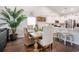 Bright dining room with modern decor, table setting, and open access to the kitchen area at 981 Mourning Dove Dr., Myrtle Beach, SC 29577