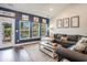 Comfortable living room with natural light and modern decor, offering a cozy and inviting space at 981 Mourning Dove Dr., Myrtle Beach, SC 29577
