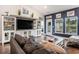 Cozy living room featuring built-in shelving, comfortable seating, and outdoor access with great flow at 981 Mourning Dove Dr., Myrtle Beach, SC 29577