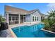 Home featuring a private pool with nice patio furniture and well-manicured landscaping at 981 Mourning Dove Dr., Myrtle Beach, SC 29577