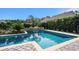 Beautiful private pool with stone accents and lush landscaping, creating a serene backyard oasis at 981 Mourning Dove Dr., Myrtle Beach, SC 29577